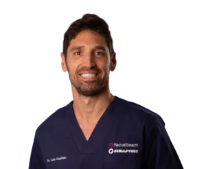 Profile picture of Dr. Luis Capitán in surgical outfit, Facial Feminization Expert at Facialteam.