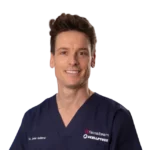 Profile picture of Dr. Javier Gutierrez in surgical outfit, Facial Feminization Surgeon at Facialteam.