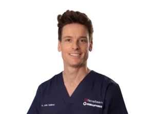 Profile picture of Dr. Javier Gutierrez in surgical outfit, Facial Feminization Surgeon at Facialteam.