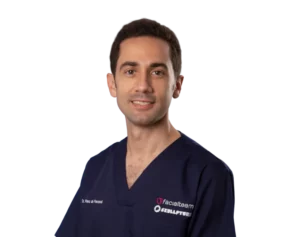 Profile picture of Dr. Miguel Perceval in surgical outfit, Facial Feminization Surgeon at Facialteam.