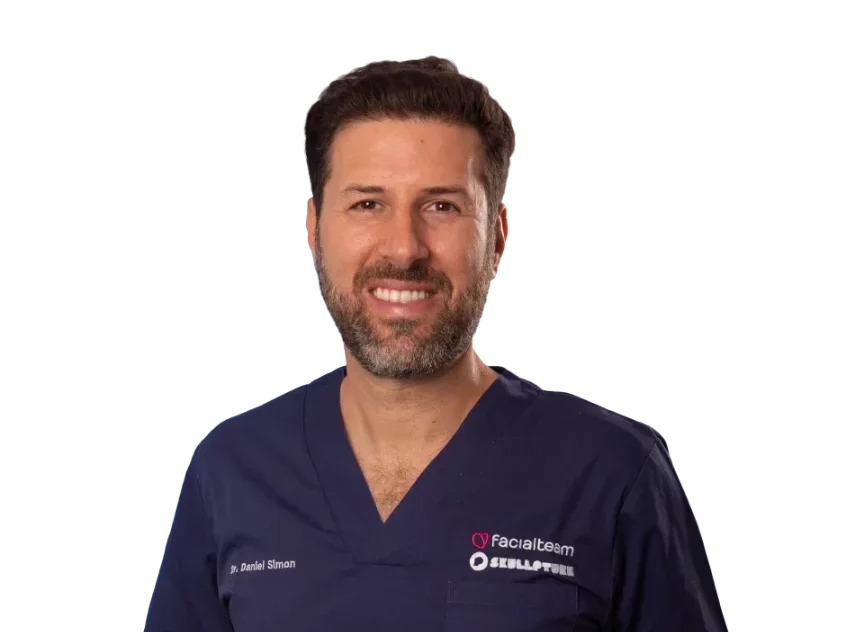 Profile picture of Dr. Daniel Simon in surgical outfit, Facial Feminization Expert at Facialteam.