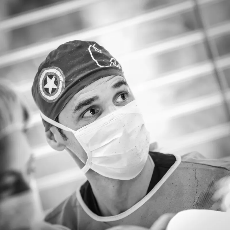 Black and white photo of dr. Captián, Facial Feminization Surgery Expert at Facialteam.