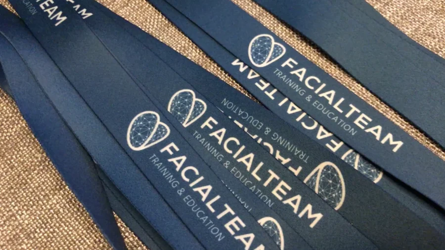 Facialteam Training and Education lanyards used to identify students during workshops and training events.