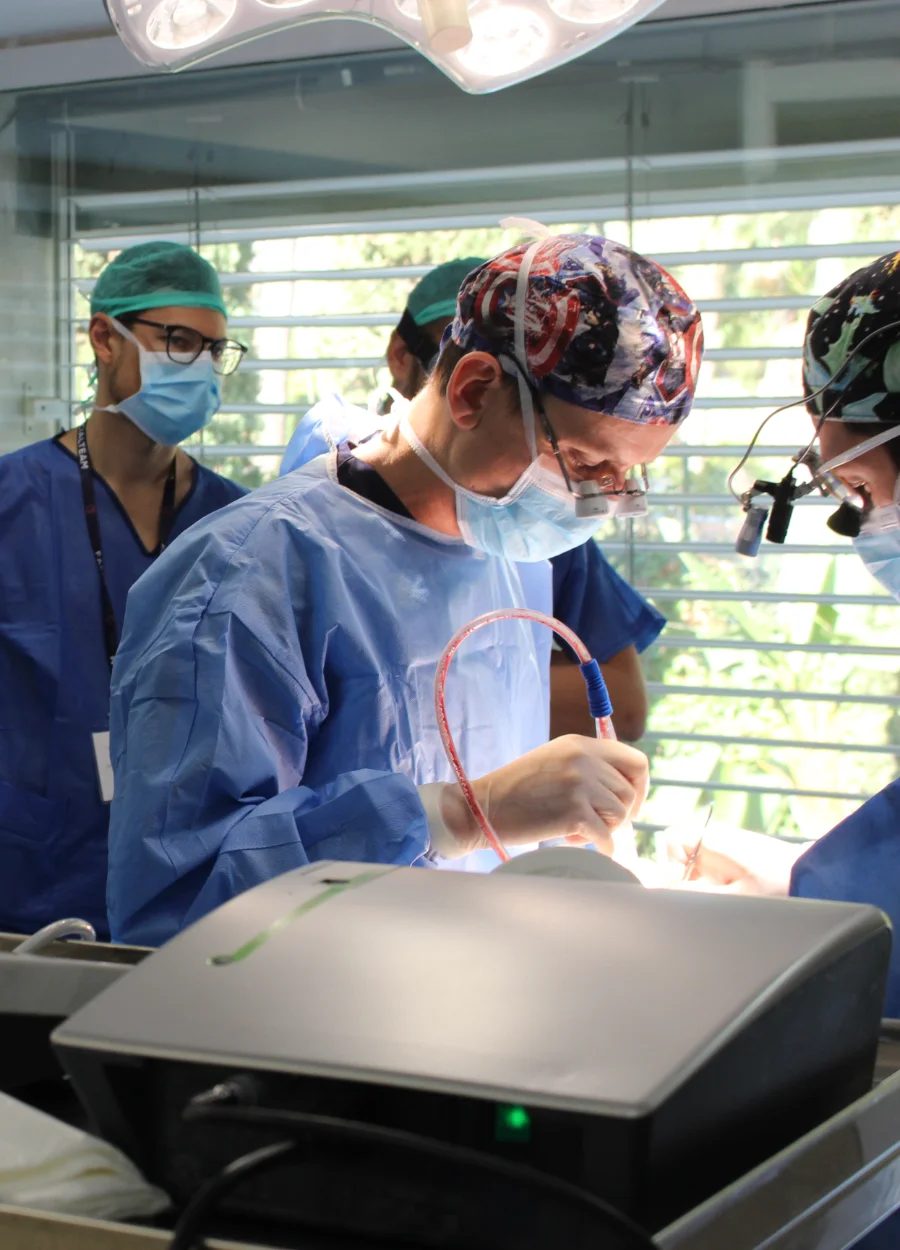 Facialteam Training and Education trainees shadowing a facial feminization surgeon during surgery.