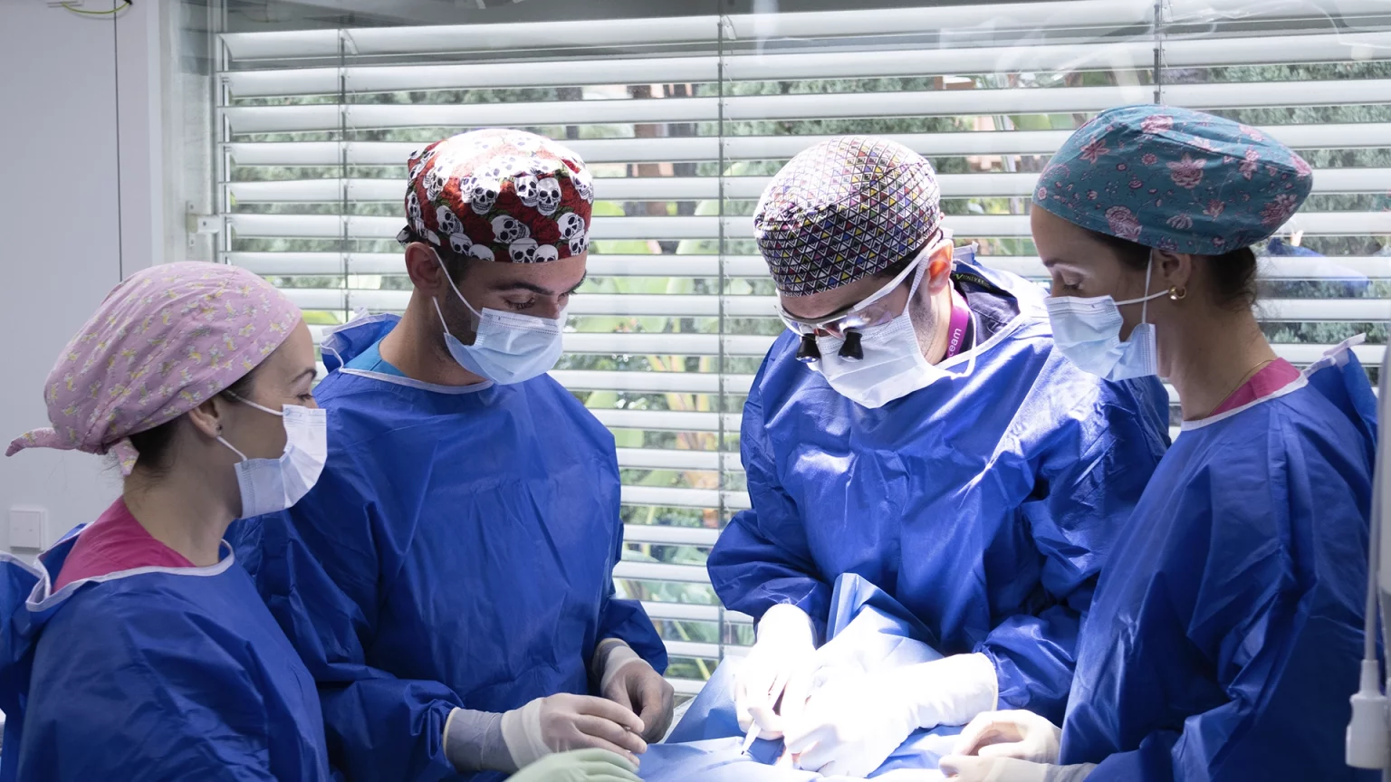 Facialteam's surgeon and nurses at the operating theathre.